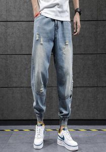 2020 New Hip Hop Harem Jeans Pantalons Men Loose Joggers Denim Papte de survêtement décontracté Korea Longueur Longueur Streetwear S08047938544