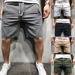 2020 nouveau Style de mode hommes décontracté court solide coton Fitness String avec poche vêtements amples Shorts253a