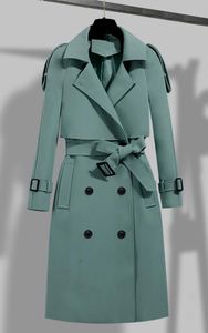 Nieuwe herfst winter elegante vrouwen jassen 2023 dubbele borsten massief trench jas vintage turn down kraag warme geul met riem