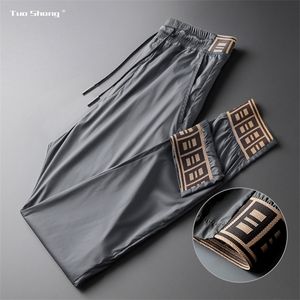 2020 printemps hommes survêtement mince cordon pantalons de sport haute mode Streetwear nouveau concepteur Joggers pantalon décontracté hommes Y1114