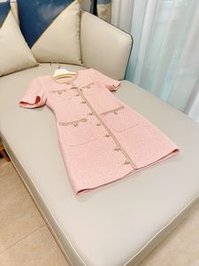 Automne Round Couche en tweed Robe lambrisée rose Couleur solide poches à manches courtes courtes robes décontractées à poitrine mono-pont 622738946335