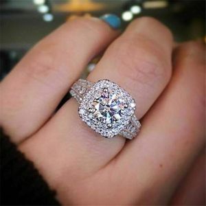2020 Más vendidos Impresionante joyería de lujo Plata de ley 925 Corte redondo Topacio blanco CZ Diamante Piedras preciosas Anillo de compromiso de boda Anillo de regalo