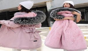 2020 femmes mode Long Lamb Hair Douner Parker Coton Veste en coton NOUVEAU FEMMES CHAUDS039 Vestes d'hiver ceinture Big Faux Fur Coats Par1927947