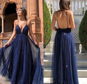 2021 Árabe Dubai Sparkly Sexy Azul marino Una línea de vestidos de baile Escote en V profundo Lentejuelas sin espalda Vestidos de fiesta de noche formales ogstuff robe de soiree