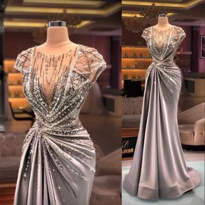 2021 Arabische sexy luxe prom jurken juweel nek illusie dop mouwen kristal kralen pailletten bling formele feestjurk avondjurken plu 277t