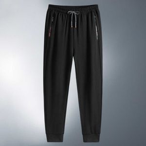 2021 automne printemps noir gris Nylon pantalons de survêtement pantalons de survêtement Streetwear Joggers empilés surdimensionné Harajuku pantalon hommes mode P0811