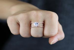 2021 Beau anneau de forme croisée X avec une goutte pavée blanche CZ Sparking Wedding Engagement Bridal Rings Delicate for Women Lady Jewelr6862124