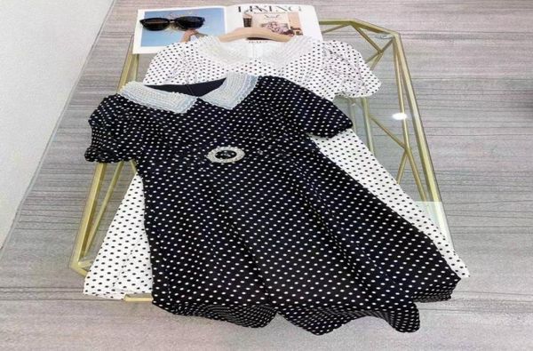 2021 BlackWhite Peter Pan Collar Mangas cortas Mujeres039s Vestido Diseñador Puntos Imprimir Cuentas Milan Runway Vestido 2021064214910