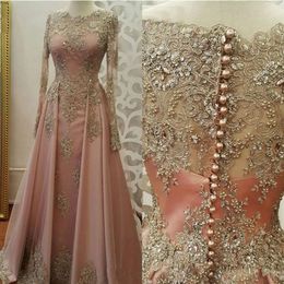 2021 Blush roze prom -jurken voor vrouwen dragen juweel nek lange mouwen gouden kanten appliques kristal kralen sexy formele avondfeestjurken 212y