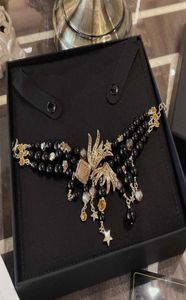 2021 Merk mode -sieraden dames parels feest sieraden zwarte kristallen kralen Spring Show Design Yellow Star Snowflake Luxury6493946