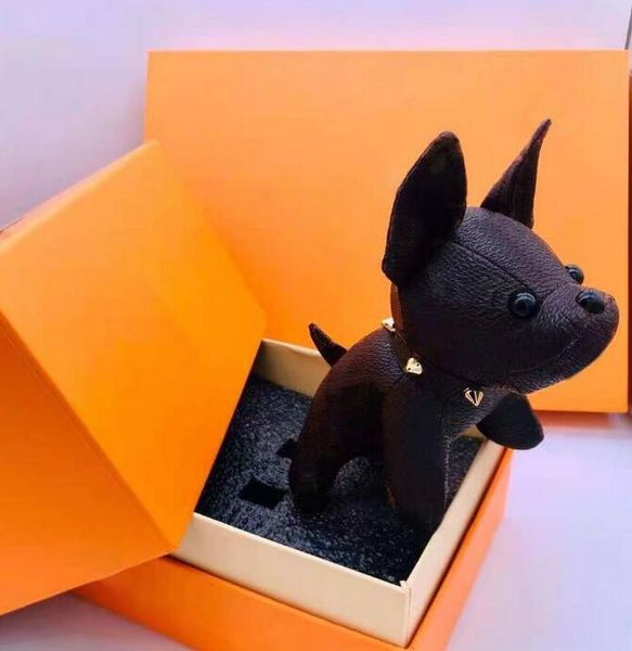 Diseñador de moda Animal de dibujos animados Perro pequeño Llaveros Accesorios Llavero PU Carta de cuero Patrón Llavero de coche Regalos de joyería con caja