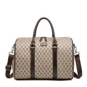 2021-Designers Duffel Bags 50CM luxe grande capacité voyage Haute qualité femmes hommes en cuir véritable épaule mode sac carr238s