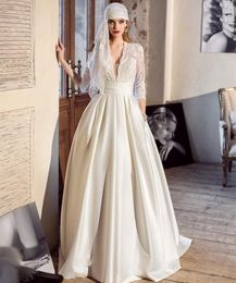 2021 Elegante Arabische Ivory A-lijn Trouwjurken met zakken 3/4 Lange mouw Simple Lace Satin Bruidsjurken Vloerlengte Vestidos de Novia