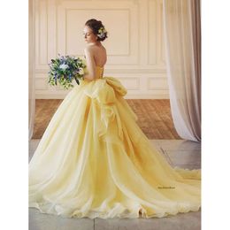 2021 Elegante prachtige gele lieverd baljurk Quinceanera jurken kanten applique avond prom jurken big boog knoop formeel zoet 15 feestjurk gewaden de bal 0509