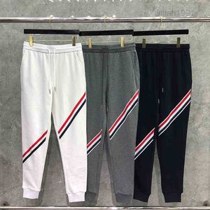 2021 Modemerk TB Sweatpants Men Dames Spring herfst Katoen Casual Sports Tracksuit Striped Jogger Track Pants