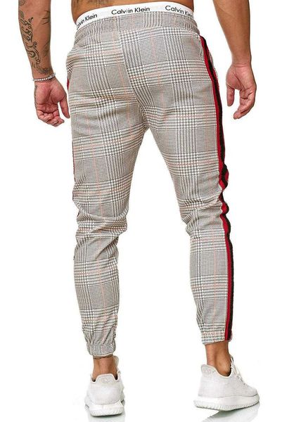 2021 Pantalon à rayures pour hommes chauds Casual Pantalon crayon lâche Slim Fit Plaid Stripe Stripe Skinny Jogger Casual Pantalon de haute qualité Y0811
