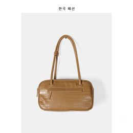 2021 nuevas mujeres coreanas diseño de nicho de color sólido patrón de cocodrilo caja cuadrada tendencia bolso de hombro personalizado
