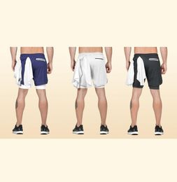 2021 hombres pantalones cortos de gimnasio que corren ropa de entrenamiento para hombres secando rápido 2 en 1 entrenamiento de fitness deportes de playa pantalones cortos para jogging 7267941