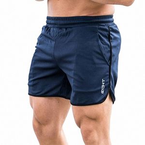 2021 Hommes Gym Training Shorts Hommes Sports Casual Vêtements Fitn Entraînement Courir Grille Séchage rapide Compri Shorts Athlétisme X3Ov #