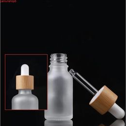 2021 tapón de bambú natural Frost Glass Dropper Bottle Aromaterapia Suero líquido 1 oz aceite de masaje básico esencial Pipeta Recargable buena calidad