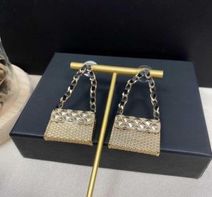 Boucles d'oreilles en forme de sac en métal pour femmes, nouvelle marque de bijoux à la mode, Design de sac de gelée, boucles d'oreilles de fête, tampon de nom C, sac écrasé, 2021, 9477973