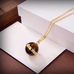 2021 New Brand Fashion Jewelry Femmes Chaîne de couleur or Brown Tiger Eye Stone Perge Pendant Collier Top Quality Quality Luxury3986351