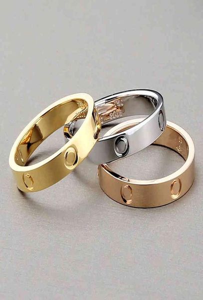 2021 Nuevo clásico Acero inoxidable Oro Amor Casado Compromiso Pareja Anillo para moda Amor eterno Joyería para mujeres Navidad Gif2660240