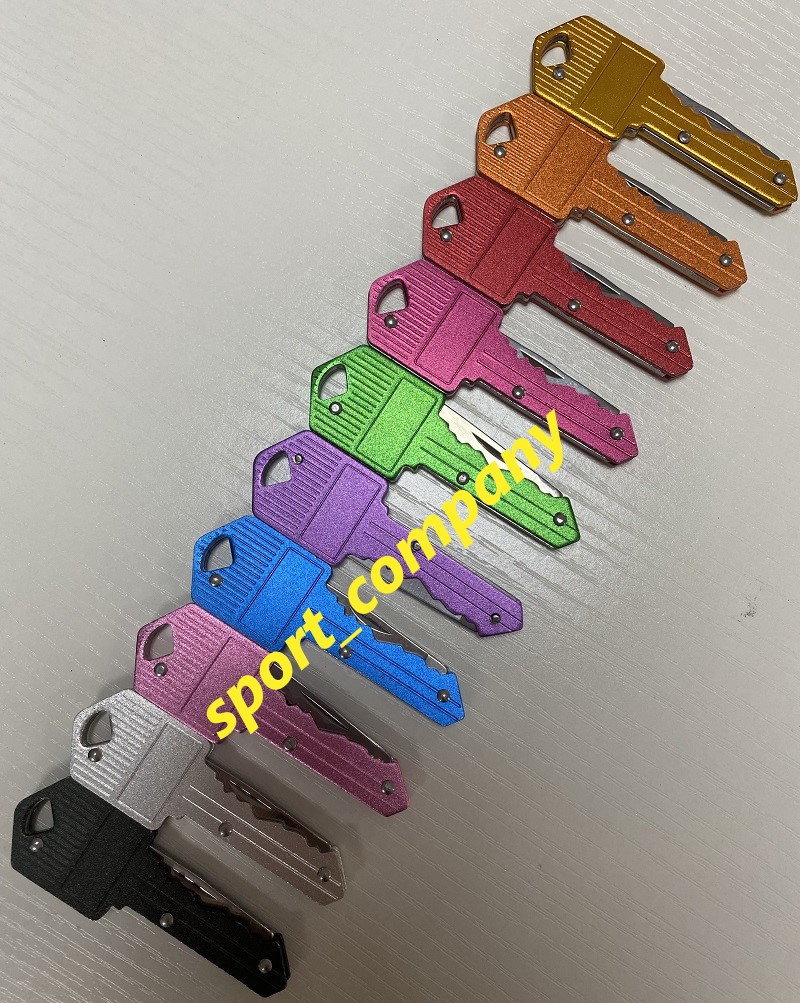 10 colori Mini coltello pieghevole Gadget all'aperto Forma chiave Tasca Coltello da frutta Coltello portachiavi multifunzionale Sciabola Coltelli svizzeri per autodifesa EDC Tool Gear