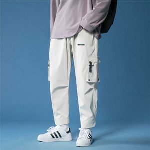 2021 Nouveaux hommes Cargo Pantalons Hip Hop Harem Multi-poches Designer coréen Pantalons de survêtement Streetwear Casual Cargo Joggers Hommes Plus Taille X0615