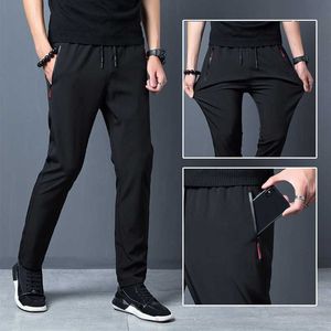 2021 Nouveaux hommes Pantalons Joggers Fitness Casual Séchage rapide Pantalon de survêtement en plein air Respirant Slim Elasticity Pantalon Plus Taille Hommes Pantalon Y0811