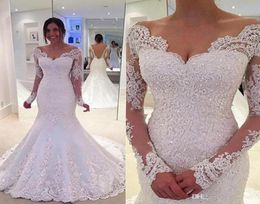 2021 Nouvelles robes de mariée de sirène moderne à manches longues V Neck White Ivory Lace Appliques Perbe Train Court Sheer Back Custom Bridal6176725