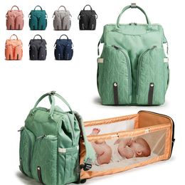2021 Nouveau sac et bébé sac pliant lit maman sac double épaule à couches multi-fonctionnelle sac maman fabricant de sacs