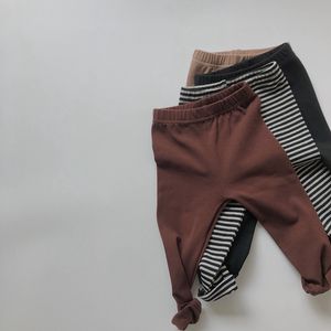 2021 New Spring Baby Kids Leggings elásticos Estilo coreano Color sólido a rayas unisex Pantalones delgados