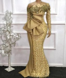 2021 Sexy élégant africain manches longues dentelle sirène robes de bal or voir à travers l'épaule paillettes cristal perlé robes de soirée porter robe de soirée avec arc