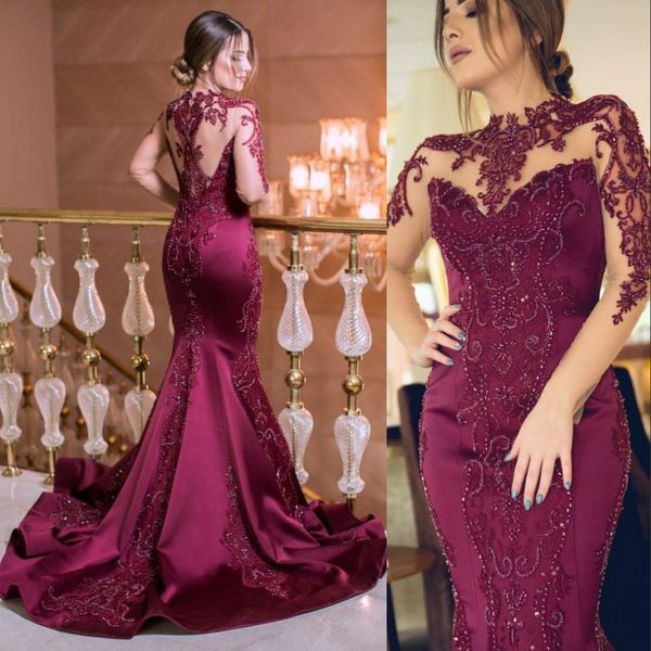 2023 Vestidos de baile Sexy Sirena árabe de lujo Rojo oscuro Borgoña Joya Cuello Ilusión Manga larga Apliques de encaje Cuentas de cristal Vestidos de fiesta Vestido de noche Arabia Saudita