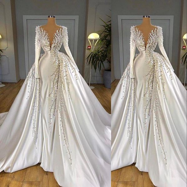 2021 Vestidos de novia de sirena de cristal de perlas de lujo sexy Mangas largas con sobrefalda Tren desmontable Vestidos de novia con cuello en V profundo Vestido de bodas elegante batas de mari￩e