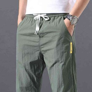 2021 verano hombres pantalones deportivos al aire libre pantalones casuales Color sólido cintura elástica ligero Comfortab Ma pantalones largos de talla grande H220715