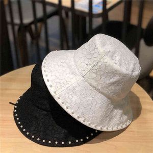 2021 Mujeres Sombreros de moda Negro Blanco Perla Plegable Transpirable Hueco Pescador Sombrero Protección solar Playa Sombrero para el sol G220311