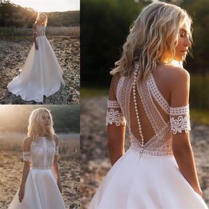 2022 Hermosas perlas Vestidos de novia bohemios Ver a través de la parte superior Imperio Cintura Hombro Mangas cortas Romántico Encaje Satén A-line Count217m