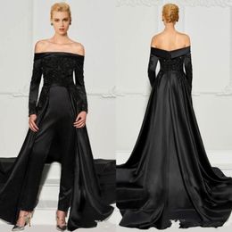 2022 Robes de soirée à sauts en dentelle noire avec train détachable des robes formelles perlées épaule
