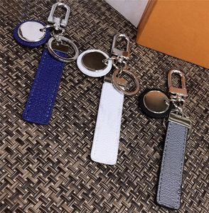 2022 Negro / Blanco / Gris PU Cuero Llavero Anillo Accesorios Moda Coche Llavero NEO Club Llaveros Hebilla para hombres Mujeres con caja al por menor