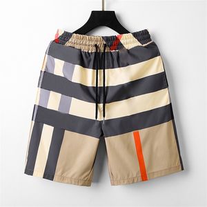 korte Brand designer herenshorts Zwart Kaki zomermode streetwear sneldrogend badpak streep printboard strandbroek M-3XL