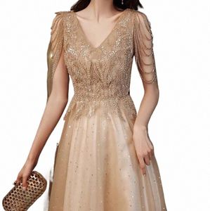 2022 Champagne Gold Soirée Dres avec Cape Une ligne Sexy Col en V A-ligne Brillant Luxe Perles Châle Formelle Celebrity Robes de bal F8zW #