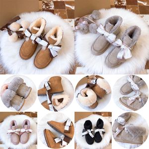 2022 Kids Ugi Bow Hair Ball Winter Snow Boots Girls Chaussures Enfants Boys Chaussures Designer Sneaker Outdoor Fashion Australie Classic Boot Baby Kid Youth Youth Toddler enfant