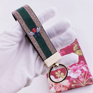 Diseñador Llavero Llavero Hebilla Llaveros Amantes Marca de cuero hecha a mano Flores coloridas Abeja Serpiente Bolsa Colgante Accesorios de moda