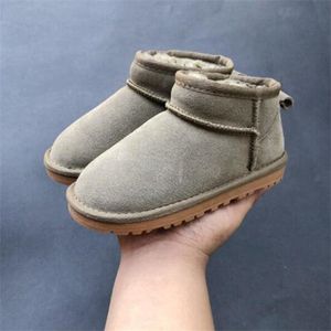 2022 Designer Snow Boots Kinderschoenen Girl Boy Echt lederen Toddlers Laarzen Kinderschoenen Sneakers Mini Low Tube EU21-35