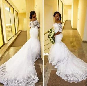 2022 elegante Afrikaanse kanten zeemeermin trouwjurken bruidsjurken met korte mouwen lange trein ivoor vestidos de novia plus size bruid jurk op maat gemaakt