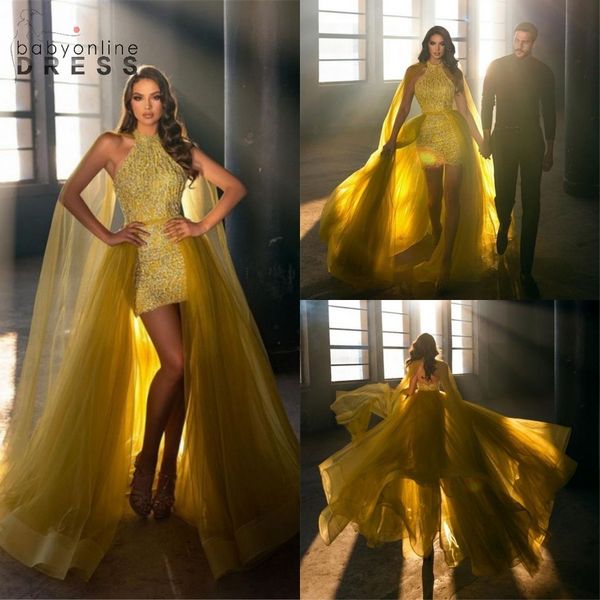 2022 Extravagantes vestidos largos de noche dorados sin mangas para baile de graduación con vaina de tren desmontable Cuentas con cuello halter Lentejuelas Fiesta de lujo Vestidos para ocasiones Árabe BC11784