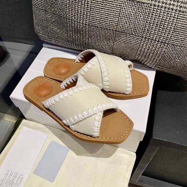 2023 Marca famosa Cruz Zapatillas romanas Diseñador de mujer Moda Sandalias planas de cuero genuino para niña París Damas Clásico Lujo Verano Casual Playa Zapatos para caminar