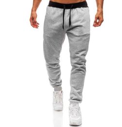 2022 Logotipo de la marca de moda Pantalones de gimnasio para hombres Joggers Fitness Pantalones largos casuales Hombres Mujeres Entrenamiento Pantalones de chándal ajustados Jogger Pantalones de chándal